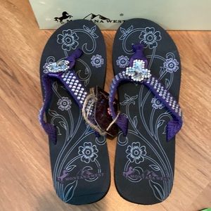 Women’s purple with cross flip flops